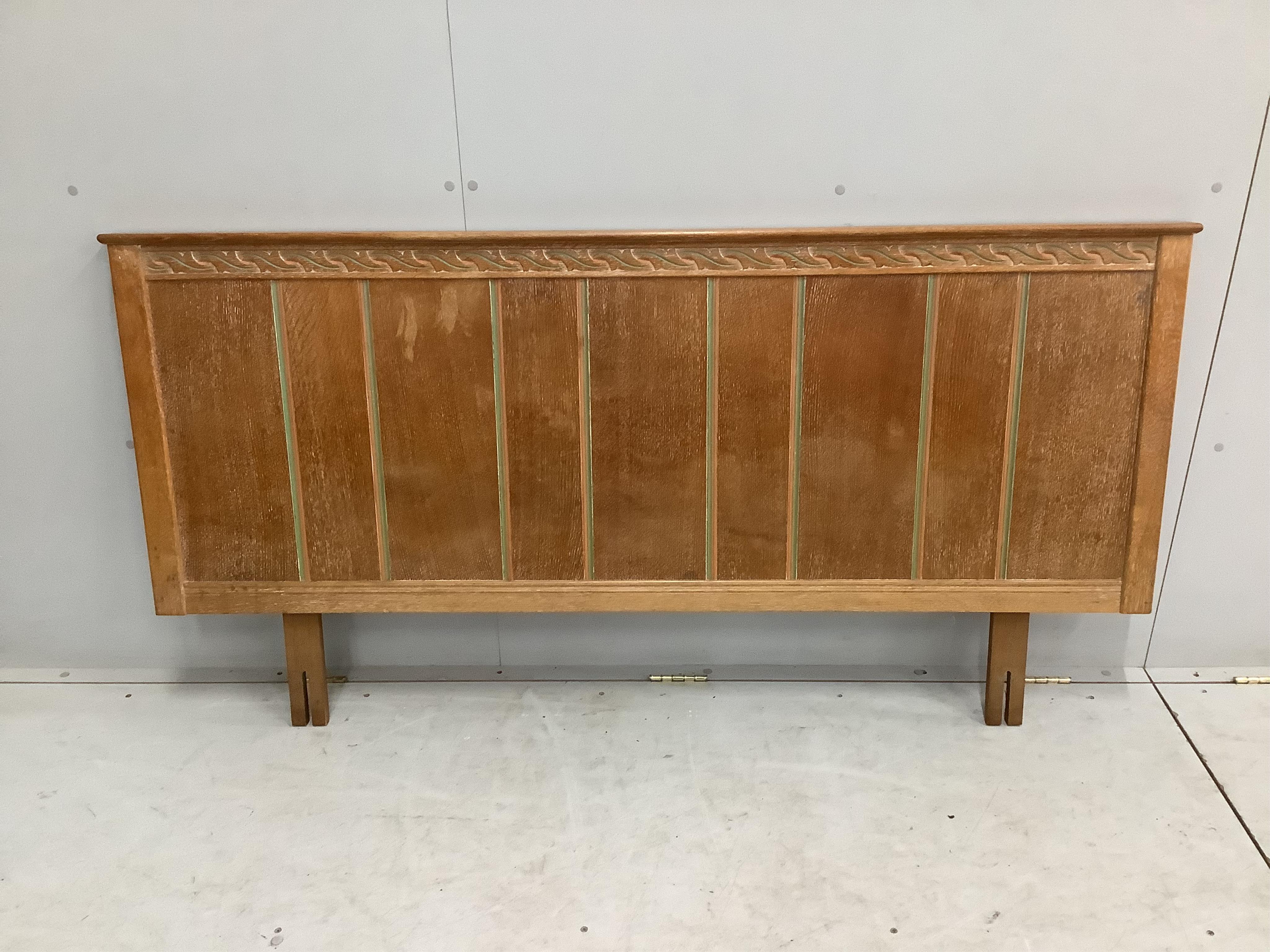 A painted limed oak eight piece bedroom suite, comprising a pair of three drawer chests, pair of bedside cabinets, dressing table stool, wardrobe and headboard. Condition - fair